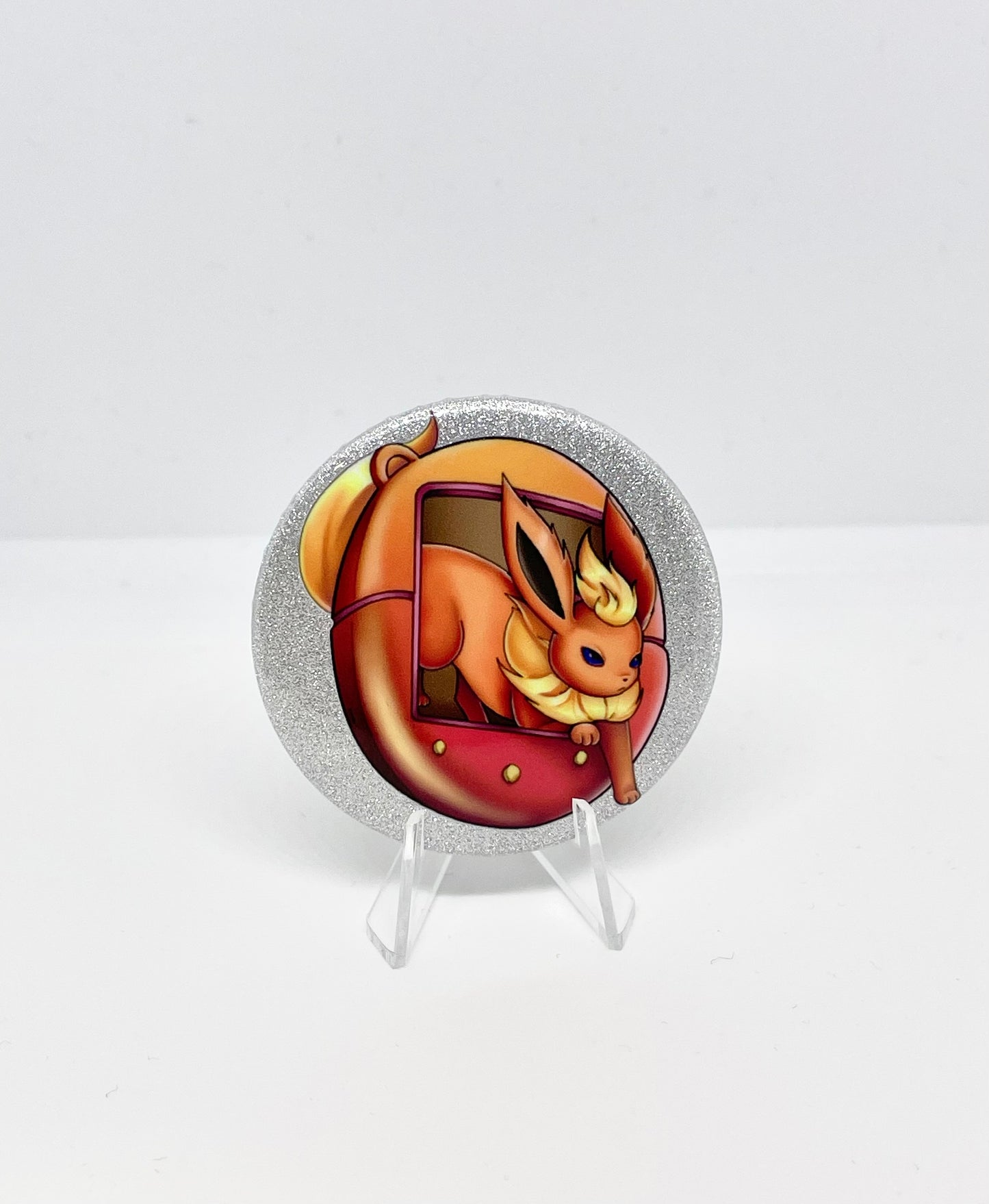 Pokegotchi: Flareon tinplate badge